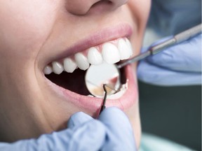 Alberta's dental fee guide means most patients pay more for checkups, a reader argues.