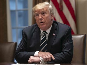 Donald Trump speaks about his meeting with Russian President Vladimir Putin ahead of a meeting with Republican lawmakers and cabinet members on tax cuts at the White House in Washington, DC, on July 17, 2018.