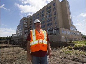 Project manager Brian Seitinger at the Charles Camsell Hospital redevelopment site, where walls are starting to go up on condos inside the building.