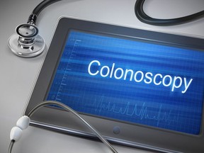 A colonoscopy word display on tablet over table.