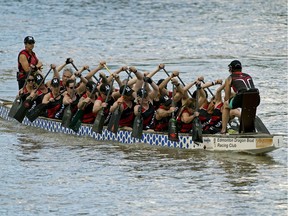 The Edmonton Dragon Boat Racing Club's seniors competitive team Tsunami  paddle on the North Saskatchewan River in Edmonton on Sunday, July 8, 2018. The team will be leaving for Hungary to compete in a dragon boat race competition on July 11 and returning at the end of July. All the team members are above 40 years of age.