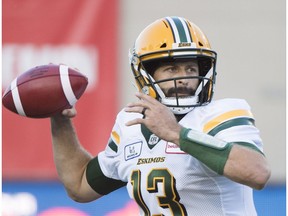 Edmonton Eskimos quarterback Mike Reilly throws a pass during first half CFL football action against the Montreal Alouettes in Montreal, Thursday, July 26, 2018.