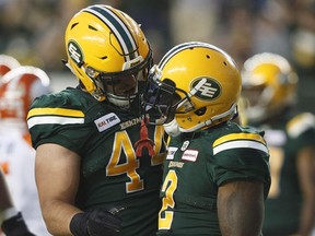 Edmonton Eskimos Alexandre Dupuis (44) and C.J. Gable (2) celebrate a touchdown against eh B.C. Lions during second half CFL action in Edmonton, Alta., on Friday June 29, 2018.