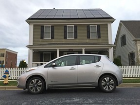 This all-electric Nissan Leaf is powered by a 10 kW rooftop solar array in this 2014 file photo.