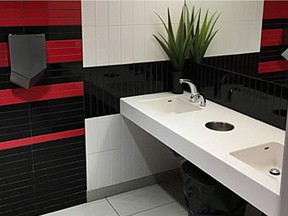 The St. Albert Honda washroom features an accent wall intended to represent the revolutions per minute (RPM) meter in a vehicle and the redline effect. Photo Supplied/bestrestroom.com