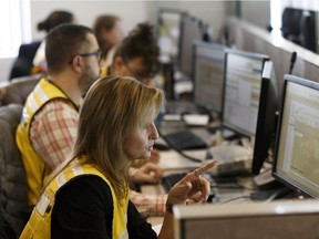 Representatives from all levels of government, emergency management agencies, industry and six communities of the Grande Prairie Regional Emergency Partnership participate in an emergency management exercise simulating a wildfire in the Grande Prairie region at the Provincial Operations Centre in Edmonton, Alberta on Feb. 28, 2018.