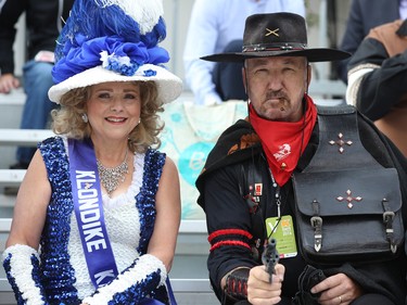 Klondike Kate (Susan Janzen) and the Klondike Kid (no other name given) wait for the start of the K-Days parade in downtown Edmonton on July 20, 2018.