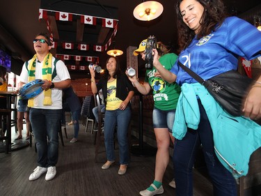 Brazilian soccer fans dance and sing at the Urban Tavern, 11606 Jasper Avenue, following the team's World Cup win Monday July 2, 2018. David Bloom/Postmedia