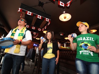 Brazilian soccer fans dance and sing at the Urban Tavern, 11606 Jasper Avenue, following the team's World Cup win Monday July 2, 2018. David Bloom/Postmedia