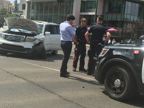 A police SUV and another SUV collided in the intersection of Jasper Avenue and 109 Street on Tuesday, July 31, 2018.