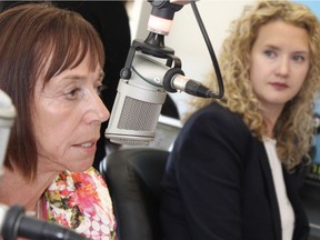 Jane Stroud, NDP candidate for Fort McMurray-Conklin, speaks while UCP candidate Laila Goodridge listens during a debate hosted by Mix 103.7 FM and Fort McMurray Today in Fort McMurray, Wednesday, July 4, 2018.