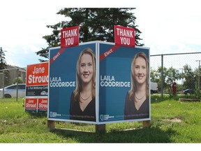 Campaign signs for Fort McMurray-Conklin byelection candidates remain at a Fort McMurray intersection on Friday, July 13, 2018, the morning after United Conservative Party candidate Laila Goodridge was declared the winner.