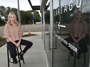 Katy Ingraham, operating partner of the neighbourhood pub Cartago, has faced repeated challenges opening a patio and deli in this new, medium-density, mixed use building because neighbours are concerned about parking in Forest Heights.