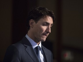 Prime Minister Justin Trudeau faces questions from reporters following his meeting with Ontario Premier Doug Ford at the Ontario Legislature, in Toronto on Thursday, July 5, 2018.