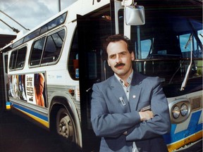 Edmonton Transit Service bus driver Brian Mason poses in front of a ETS bus on  August 24, 1989.