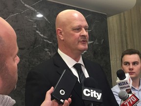 Sgt. Richard Butler, head of CPS' alcohol and drug recognition unit speaks to reporters outside a meeting of the Calgary Police Commission.