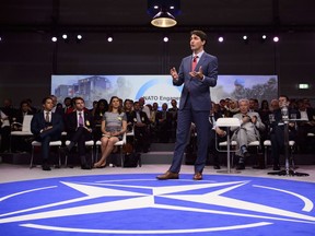 Prime Minister Justin Trudeau takes part in a NATO Engages Armchair Discussion at the NATO Summit in Brussels, Belgium on Wednesday, July 11, 2018.