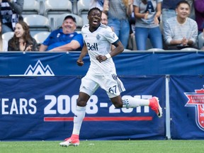 The Vancouver Whitecaps’ Alphonso Davies celebrates after scoring a goal against the Montreal Impact during their Canadian Championship league match at B.C. Place Stadium on May 23, 2017.