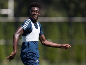 Vancouver Whitecaps midfielder Alphonso Davies smiles during MLS soccer team practice in Vancouver on Monday, July 23, 2018.