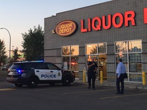 Edmonton police officers responded to a Liquor Depot store at 97 Street and 160 Avenue on Thursday, July 5, 2018. Staff Sgt. James Vanderland said an employee was stabbed twice trying to stop a theft. The employee is in stable condition.