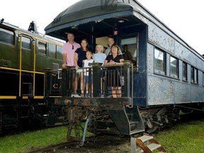 Family of Northern Alberta Railways (NAR) superintendent Johnny Deakin presented the Alberta Railway Museum with a graphic display honouring the family's history in the region and recalling the glory days of train travel across northern Alberta. The Deakin family were in Edmonton for the presentation on Saturday, July 21, 2018. In photo are Matt Coppin, left, Allie Coppin, Henry Coppin, Anna Coppin, Graham Thomas and Diana Deakin-Thomas.