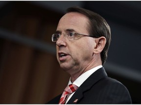 Deputy Attorney General Rod Rosenstein speaks during a news conference at the Department of Justice, Friday, July 13, 2018, in Washington.