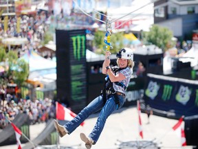 Premier Rachel Notley zips across the Calgary Stampede zipline in Calgary, on Sunday July 8, 2018. Leah Hennel/Postmedia