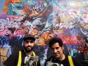 Avo, left, and Pichi — together PichiAvo — are painting Edmonton's largest street art mural this week starting on Monday, Aug. 20, 2018 at 10331 106 St.
