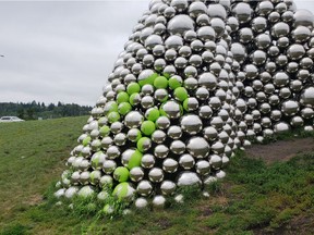 Edmonton's Talus Dome had a coat of bright green paint Saturday morning in an act of vandalism.