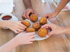 Well-intended workplace initiatives may be causing more harm than good with muffins and doughnuts in the morning and candy and treat bowls dotting the office landscape, says fitness columnist Paul Robinson.