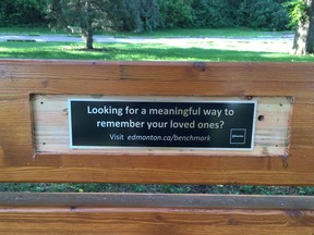 In 1997, this bench in Edmonton's Queen Elizabeth Park bore a commemorative plaque for Nora May Crossley (Dalton) who died in 1996. Her daughter received a notice from the City of Edmonton in May 2018 saying she had to pay another $2,500 to keep her mother's name on the bench. When she said she wouldn't pay, they replaced the plaque with this advertisement.