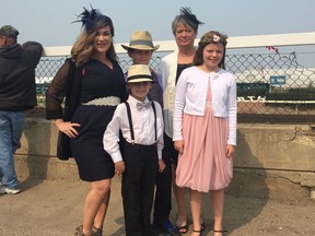 (Left to right) Brigitte Arsenault, Mason Arsenault (front), Gabriel Arsenault, Donna Hynes and Sophia Arsenault came from Camrose for the final Canadian Derby at Northlands.