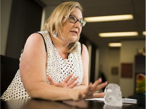 ASIRT executive director Susan Hughson, in her Edmonton office on Thursday, Aug. 16, 2018,  said sometimes investigations of police officer-involved incidents take a long time because they can't afford to make mistakes.