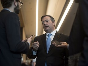 Jason Kenney, leader of the United Conservative Party in Alberta, speaks with a reporter at the Conservative national convention in Halifax on Saturday, Aug. 25, 2018.