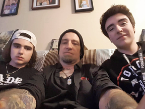 Fredericton shooting victim Donnie Robichaud, centre, with his sons Draiden and Zakkery.