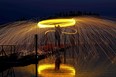 A member of the St. Albert Photography Club participates in a light painting photography session at Elk Island National Park on August 19, 2018. The club, which has approximately seventy members, has been in existence since 1992 and meets at the St. Albert Inn & Suites three times a month. (PHOTO BY LARRY WONG/POSTMEDIA)