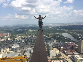 Standing on steel more than 50 storeys in the air is all in a day's work on Thursday, Aug. 2, 2018 for members of Ironworkers Local 720 employed on construction of Edmonton's Stantec Tower, Canada's tallest office building outside Toronto.