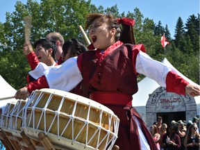 Drummers perform at the Korea Pavilion during the Heritage Festival at Hawrelak Park in Edmonton, August 6, 2018. Ed Kaiser/Postmedia