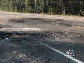 Scene of a fatal highway crash near Jasper, where both vehicles involved caught fire.