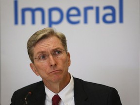 Rich Kruger, president and CEO of Imperial Oil, listens to a questions as he speaks to the media following the company's annual meeting in Calgary, Friday, April 29, 2016.