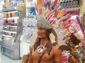 This statue of an Indigenous man wearing a headdress made of lollipops was removed from the Bubble and Gum store at West Edmonton Mall on Monday Aug. 13, 2018 after complaints it was offensive.