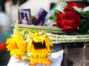 Photographs of shooting victim Reese Fallon, 18, are seen at a memorial on Danforth Avenue in Toronto on July 24, 2018.