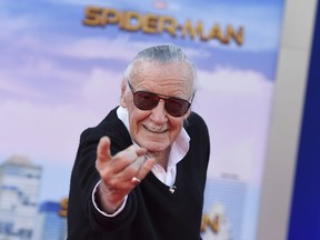 FILE - In this June 28, 2017 file photo, Stan Lee arrives at the Los Angeles premiere of "Spider-Man: Homecoming" at the TCL Chinese Theatre.