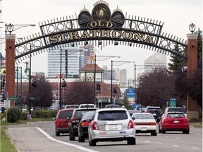 Traffic makes its way through the Old Strathcona sign near Gateway Boulevard and University Avenue, in Edmonton Alta. on Thursday Sept. 24, 2015.