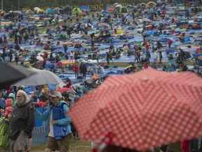 Folk Fest attendees can expect more of the same Sunday after a light rain fell Saturday evening.