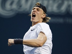 Denis Shapovalov celebrates after beating Frances Jeremy Chardy, at the Rogers Cup on Tuesday. THE CANADIAN PRESS