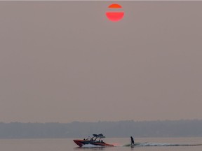 Smoke from forest fires in B.C. partially obscures the view at Pigeon Lake on Tuesday, August, 7 2018, as temperatures in the area continue to rise.