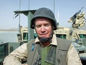 The Edmonton Journal's Graham Thomson rides "air sentry" in a Canadian armoured vehicle in the Zhari district of Kandahar province on Aug. 7, 2008.