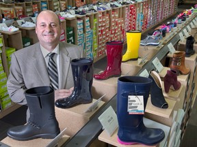 Town Shoes CEO Bruce Dinan at the DSW Designer Shoe Warehouse in Mississauga, Ont., in 2015. DSW says it is shuttering the Town Shoes brand.