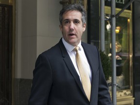 Michael Cohen, former personal lawyer to President Donald Trump, leaves his apartment building, in New York, Tuesday, Aug. 21, 2018.